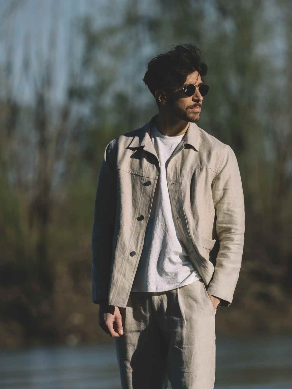 Person wearing Opera Campi clothes walking in nature