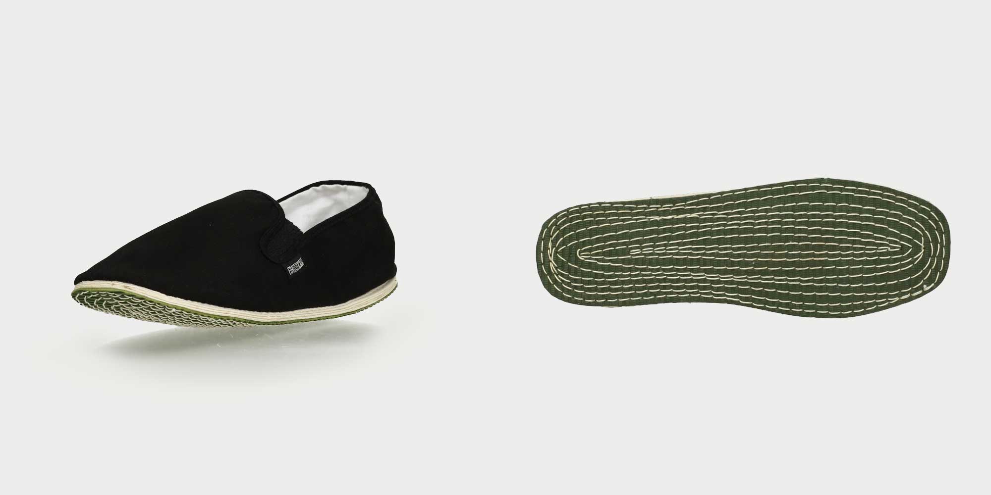 Side view and underside view of black eco-friendly slippers by Ethletic.