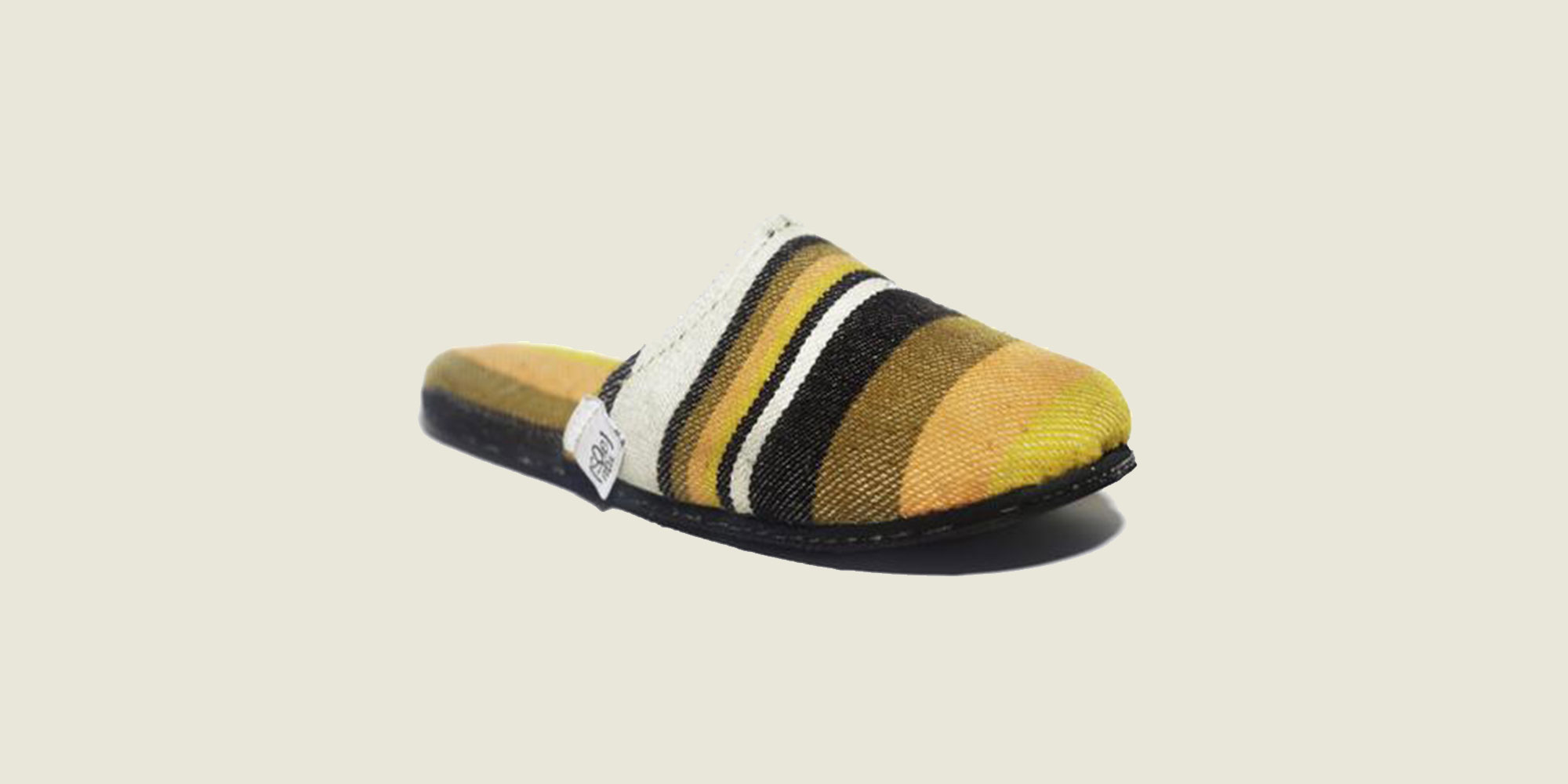 Close up of colourful ethically made sustainable slippers by SoleRebels.