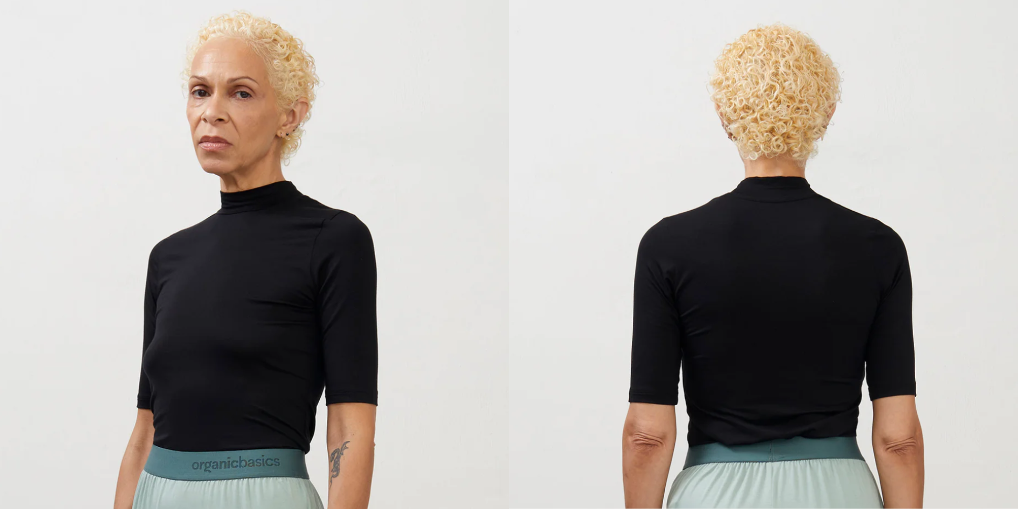 Someone in black turtleneck by Organic Basics.