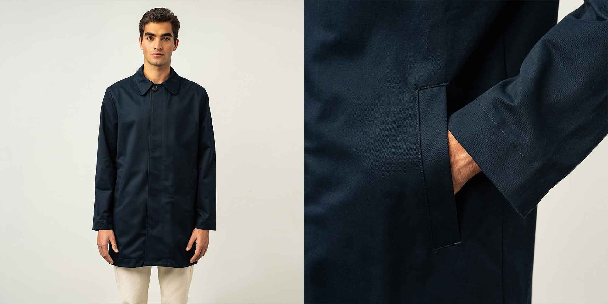 Shot of someone wearing a navy blue car coat ethically made by ISTO.