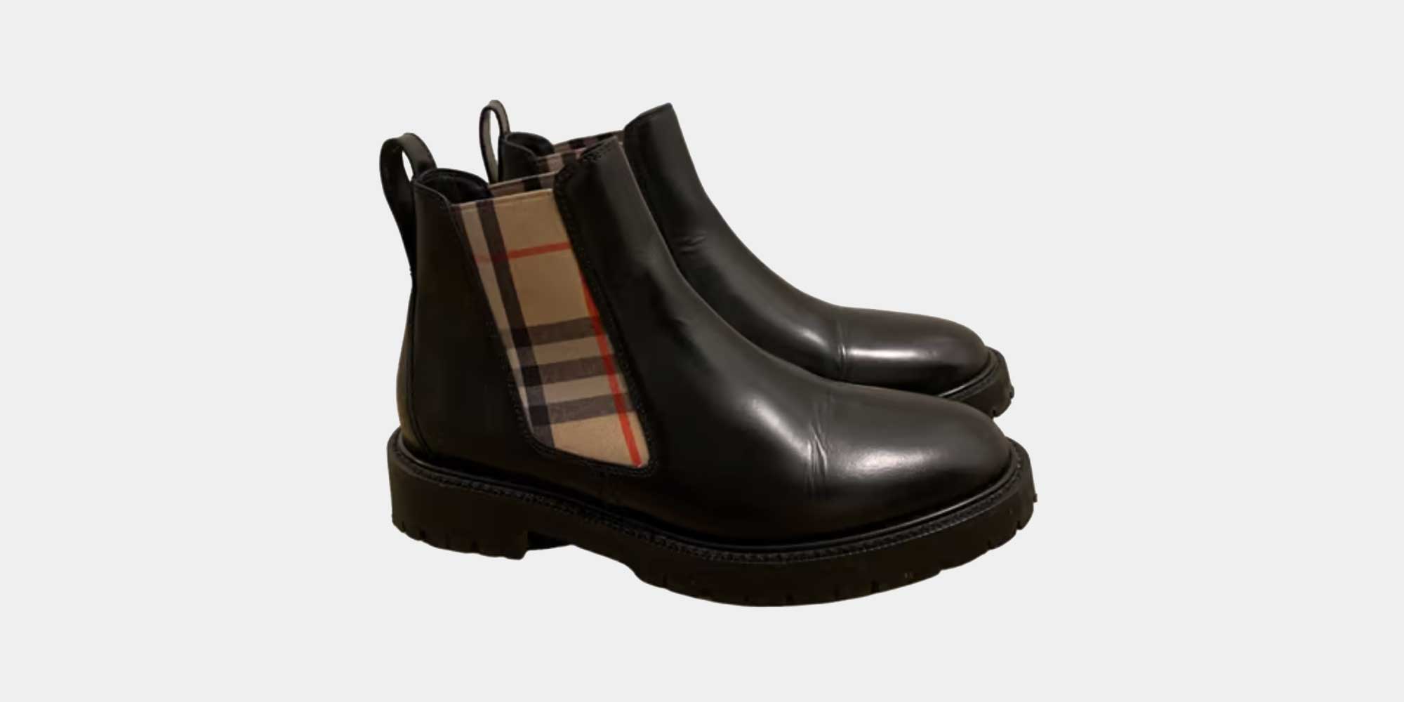 Second hand black Chelsea boots with pattern detailing via Vestiaire Collective.