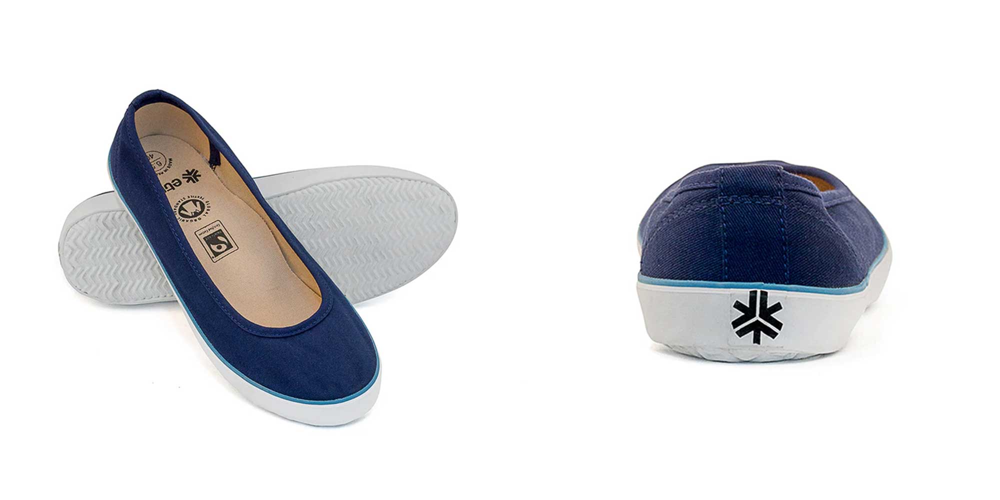 A pair of dark blue ballerina sneakers by Etiko.