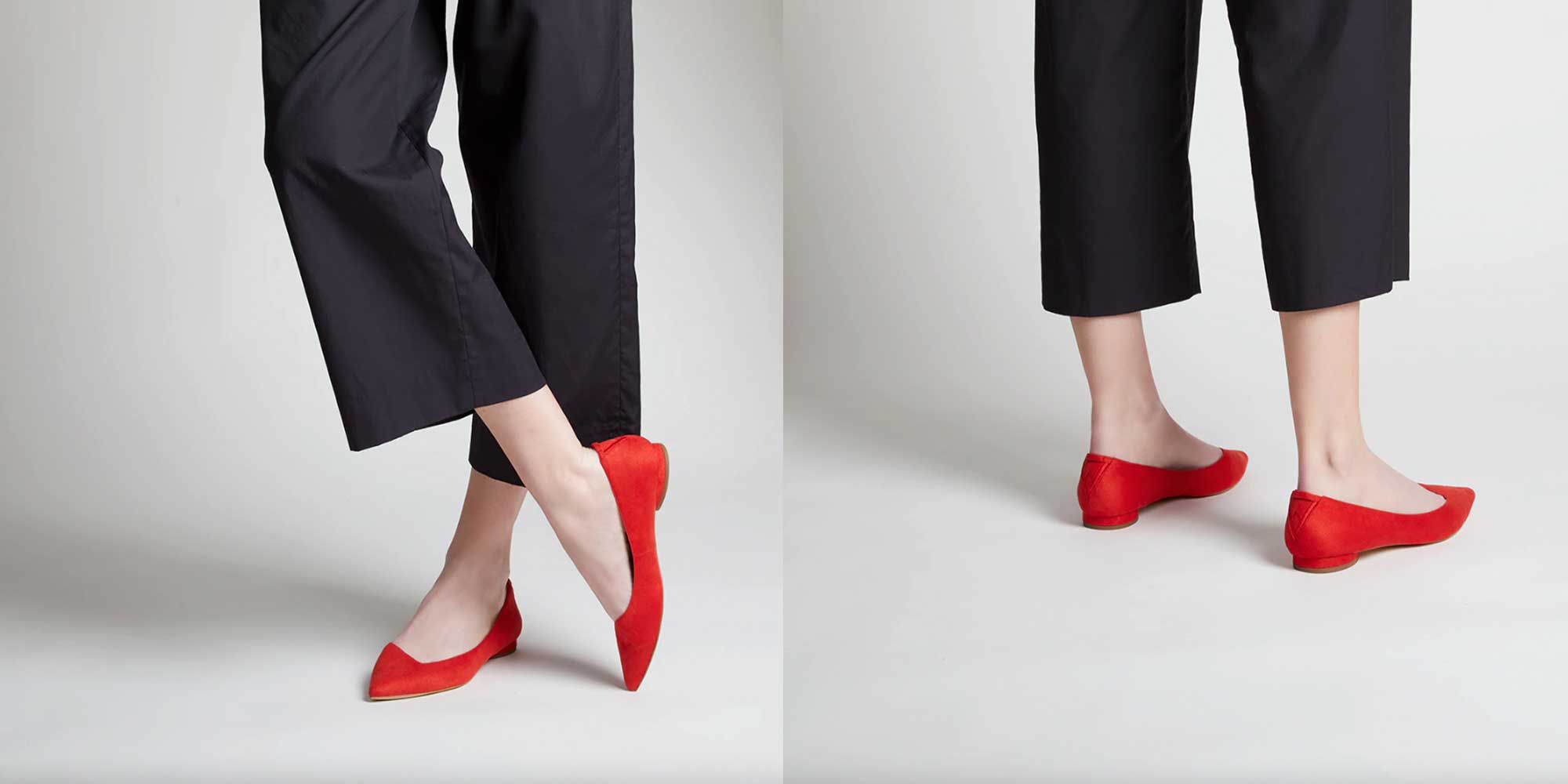 A pair of bright red pointy ballerinas by VEERAH.