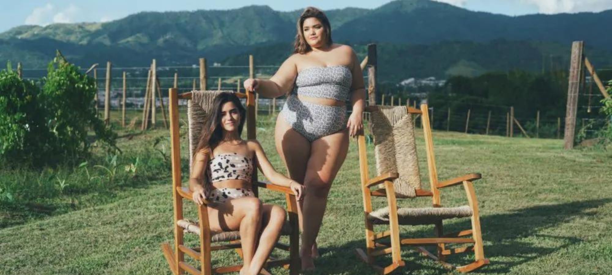 Two people outdoors wearing swimmers by Vigo Swim.