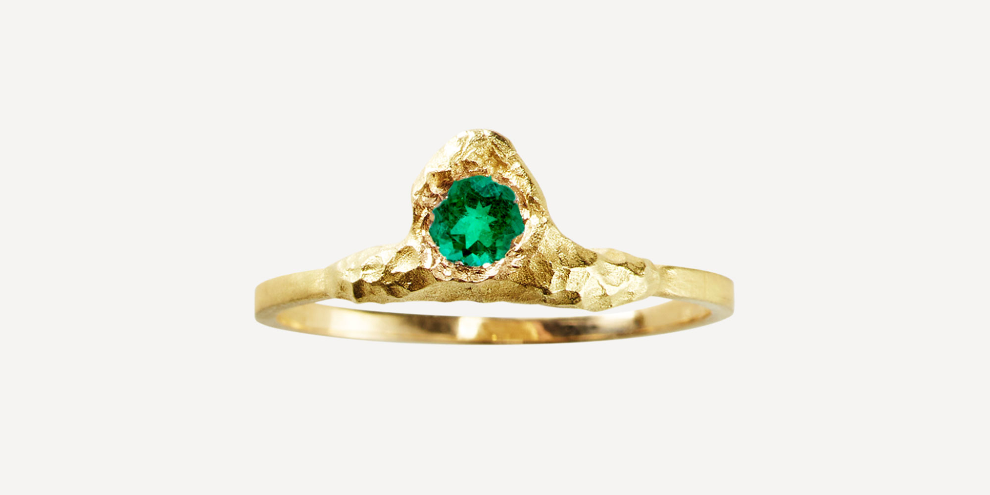 A classic emerald solitaire ring by Orit Elhanati.