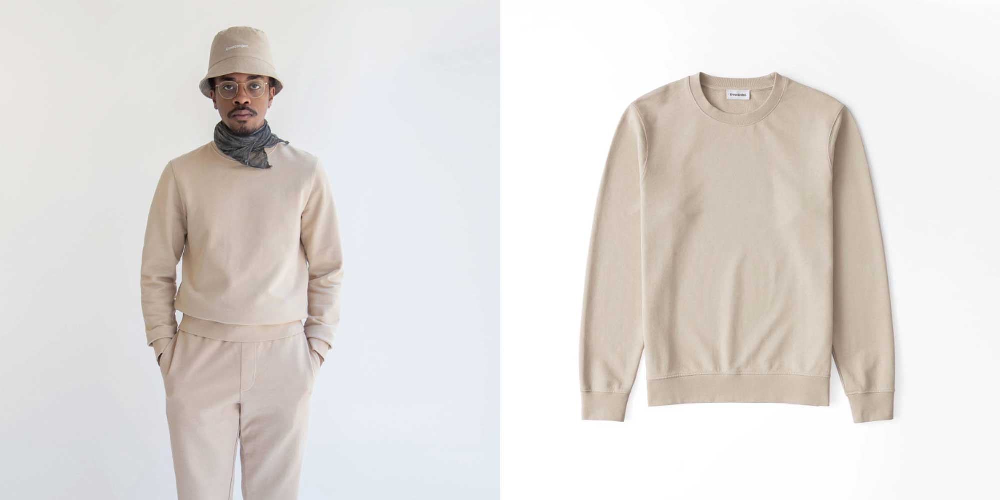 A person wearing a beige crew neck sweatshirt by Unrecorded.