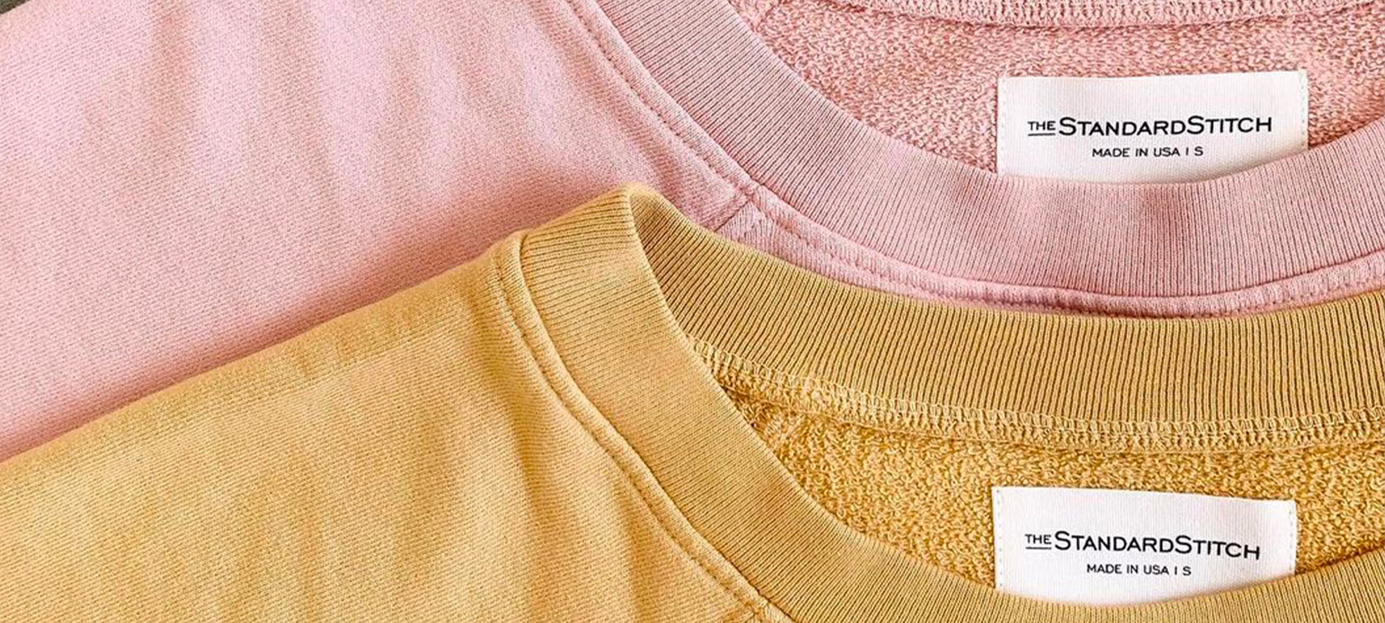 Pink and yellow eco-friendly t-shirts by The Standard Stitch.
