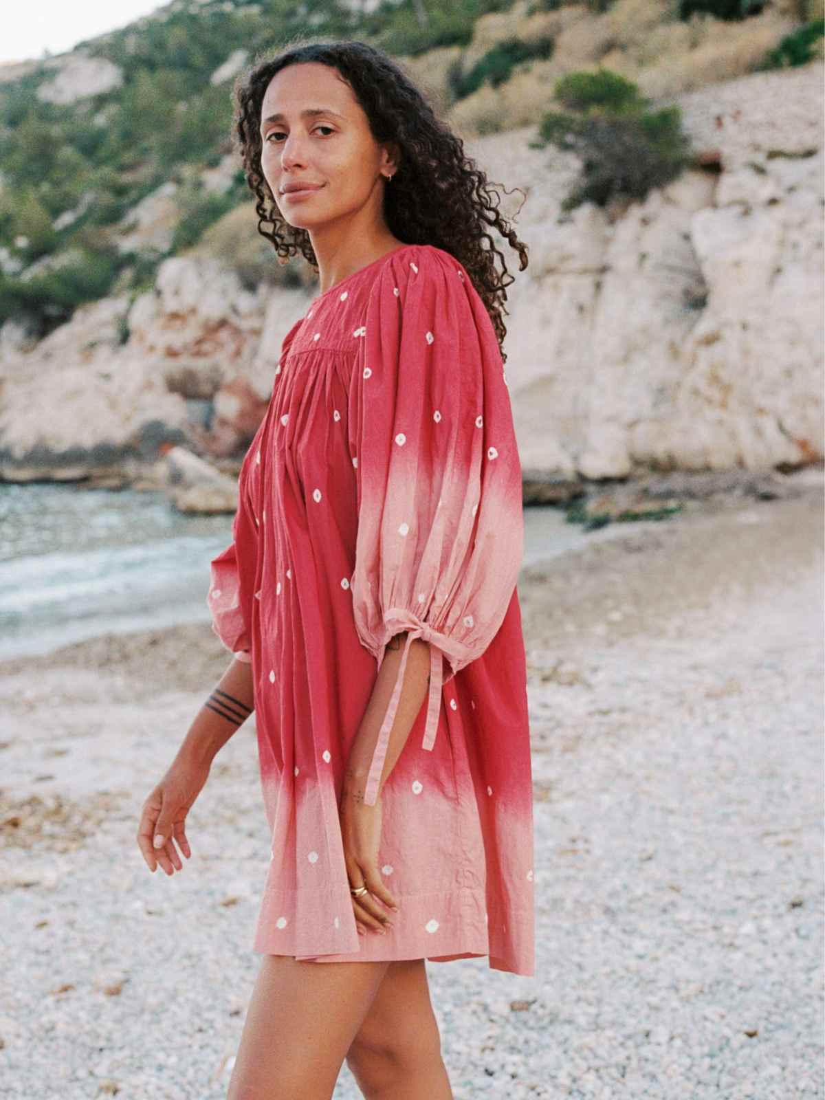 Person wearing pink mini dress from Christy Dawn