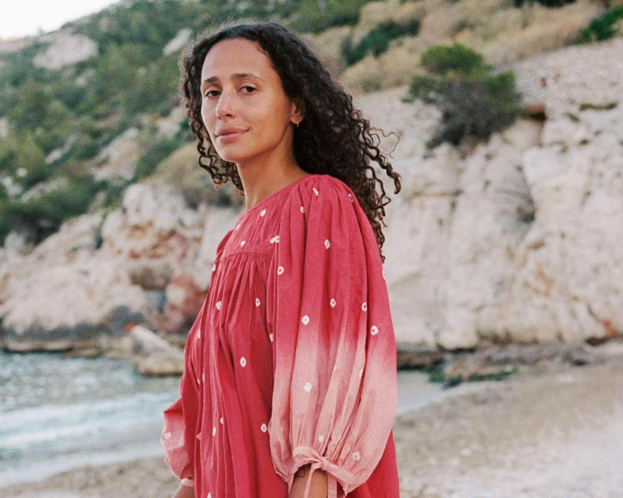 Person wearing pink mini dress from Christy Dawn