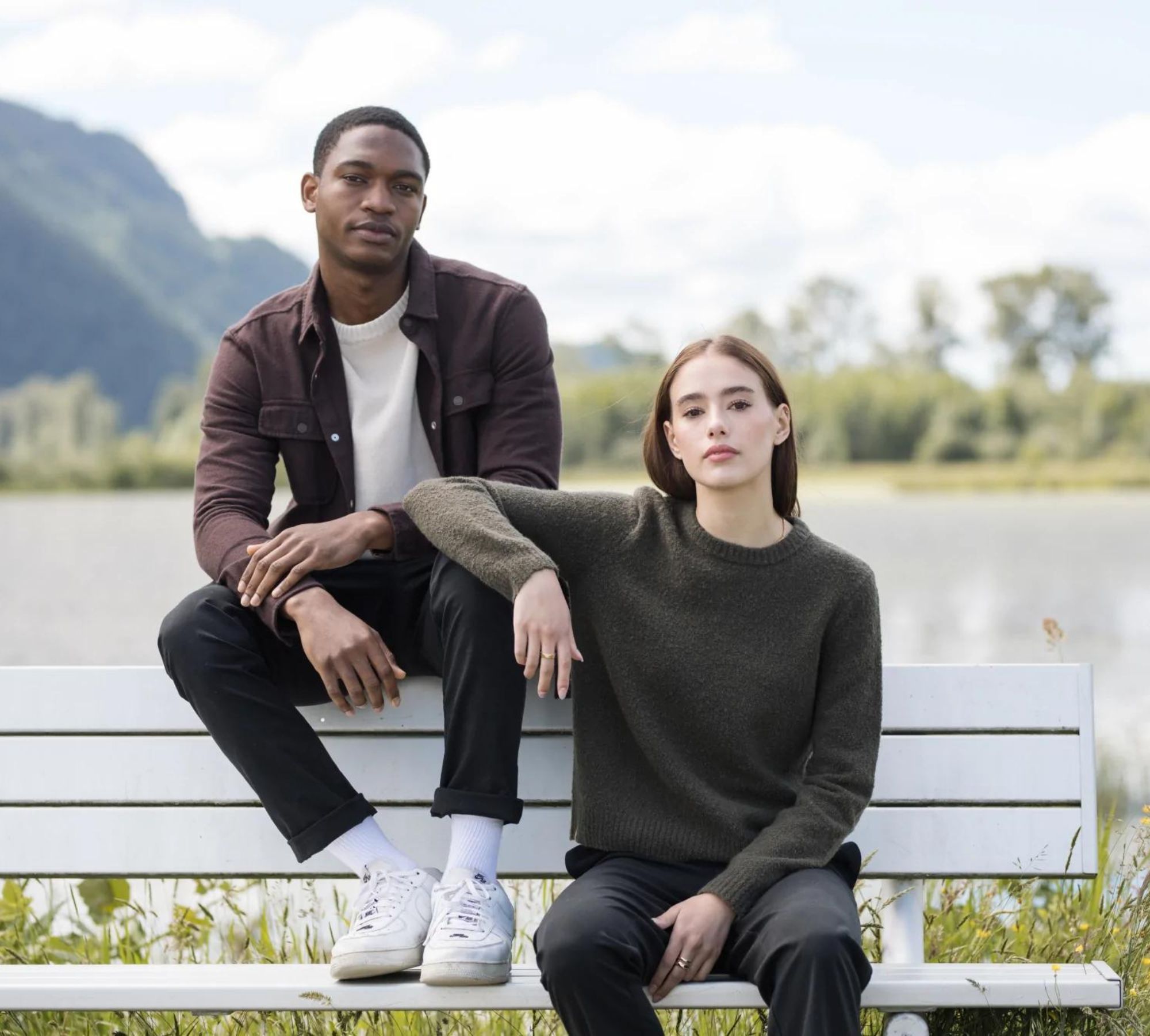 Two people wearing Circularity by tentree clothing.