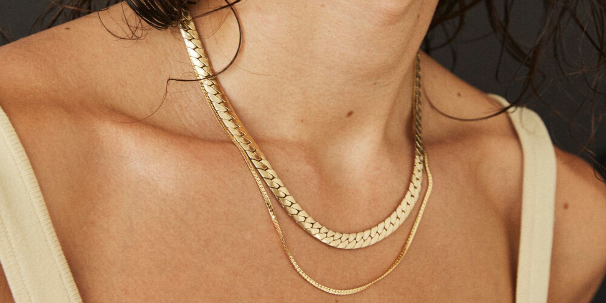 A gold plated chain necklace by Laura Lombardi.