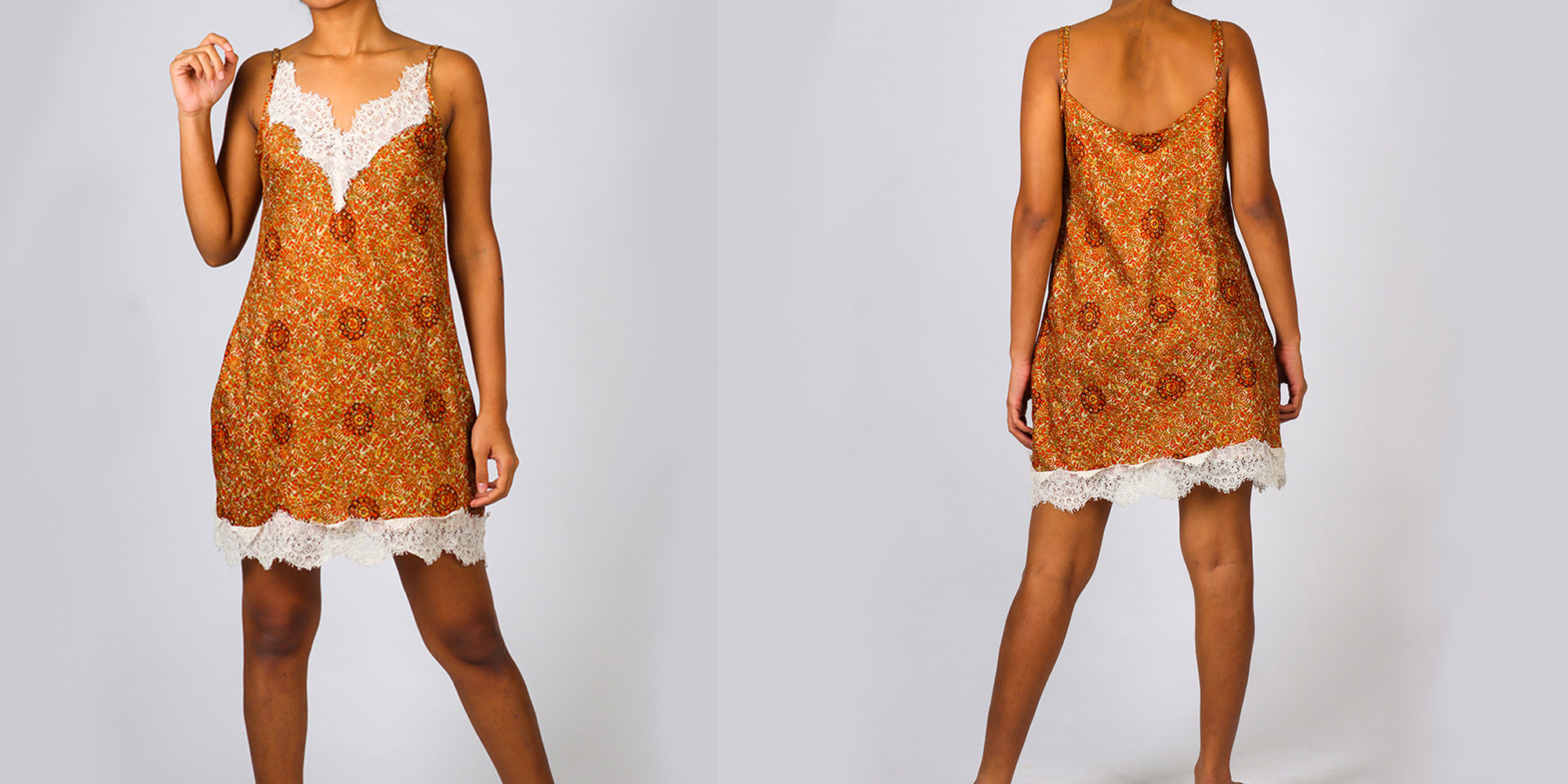 A woman in a rust coloured ethical dress.