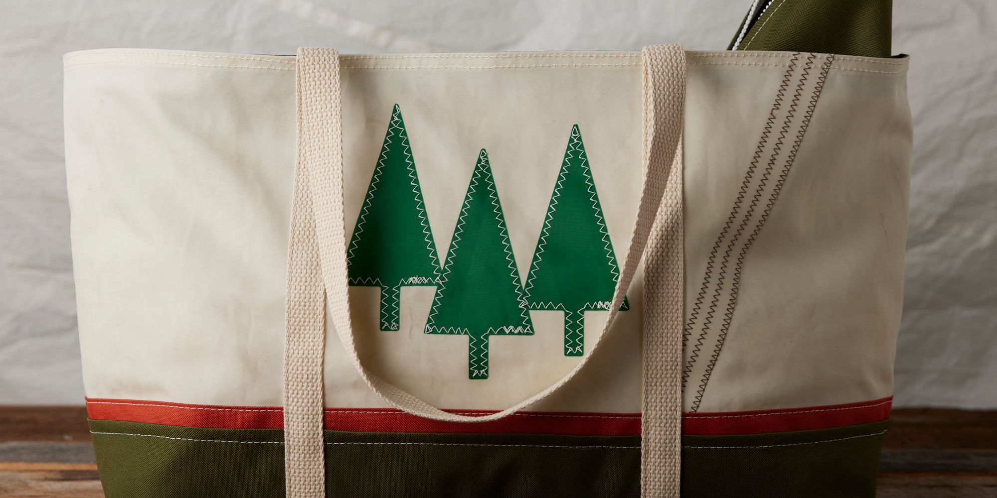 A pine tree print upcycled sail tote by Casco Totes.