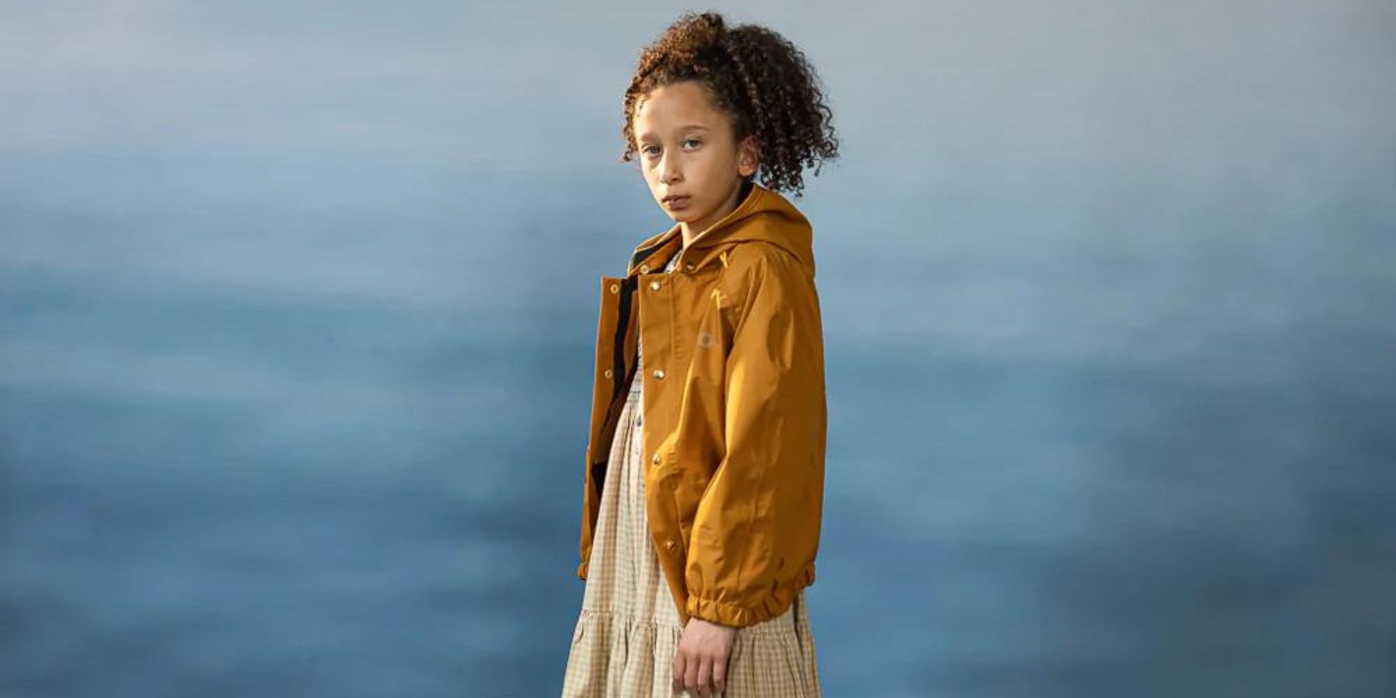 An ochre kids' outerwear jacket responsibly made by fairechild.