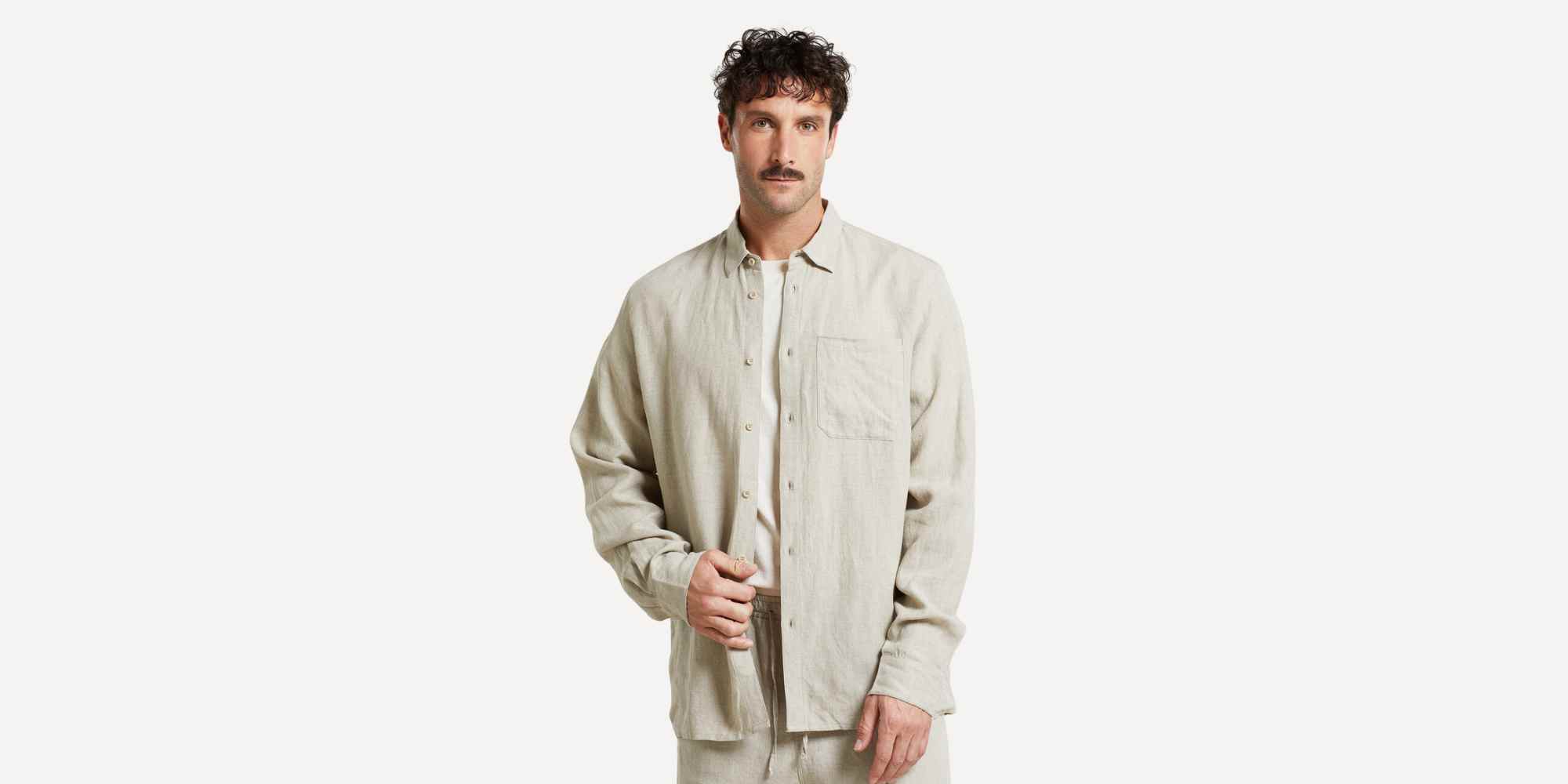 person wearing beige shirt from dedicated