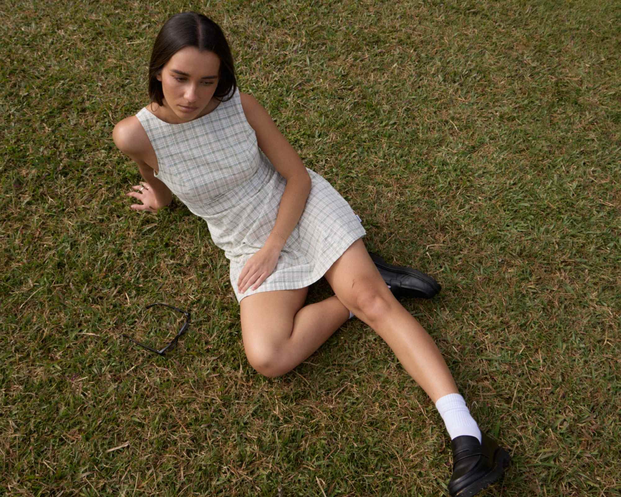 person wearing checked dress from afends