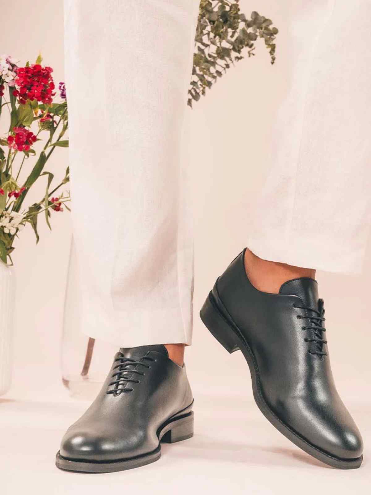 person wearing vegan oxford shoes from NAE