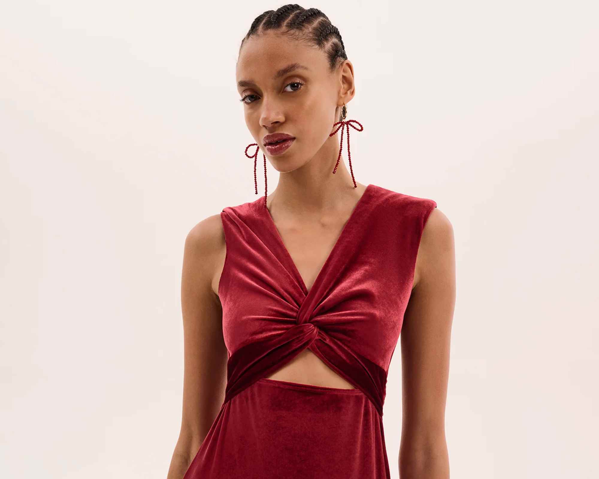 person wearing velvet dress from omnes