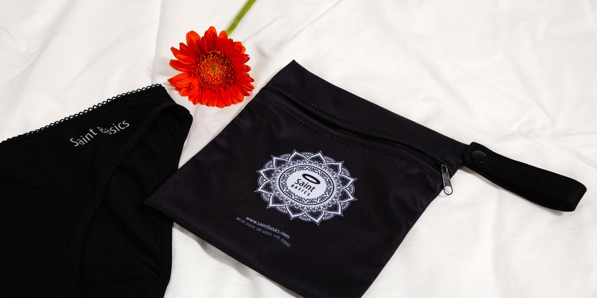 The black St. Beatrice period underwear and wetbag responsibly designed by Saint Basics.