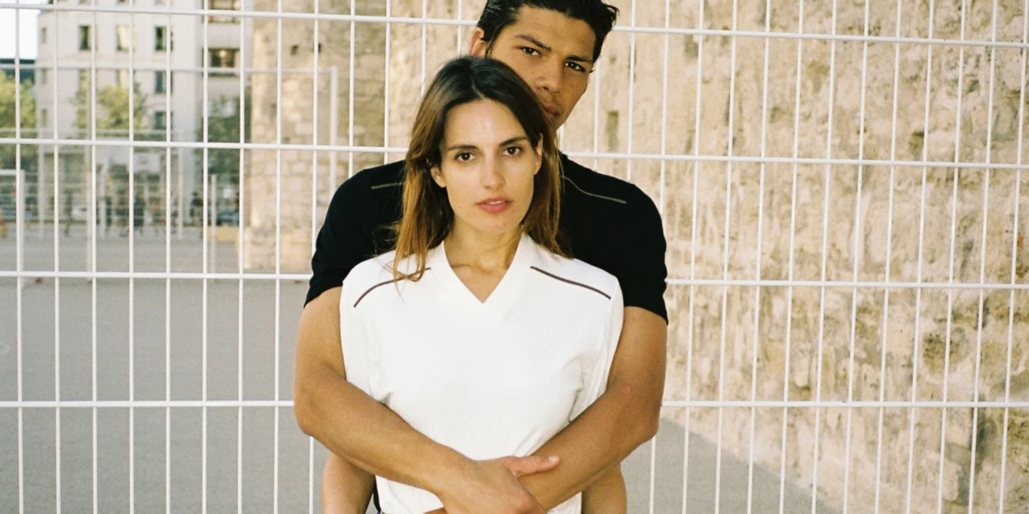 people embraced in tops by FM 669.