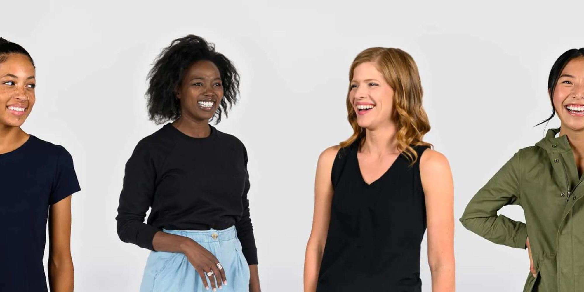 Four people wearing essentials responsibly made by Pareto.