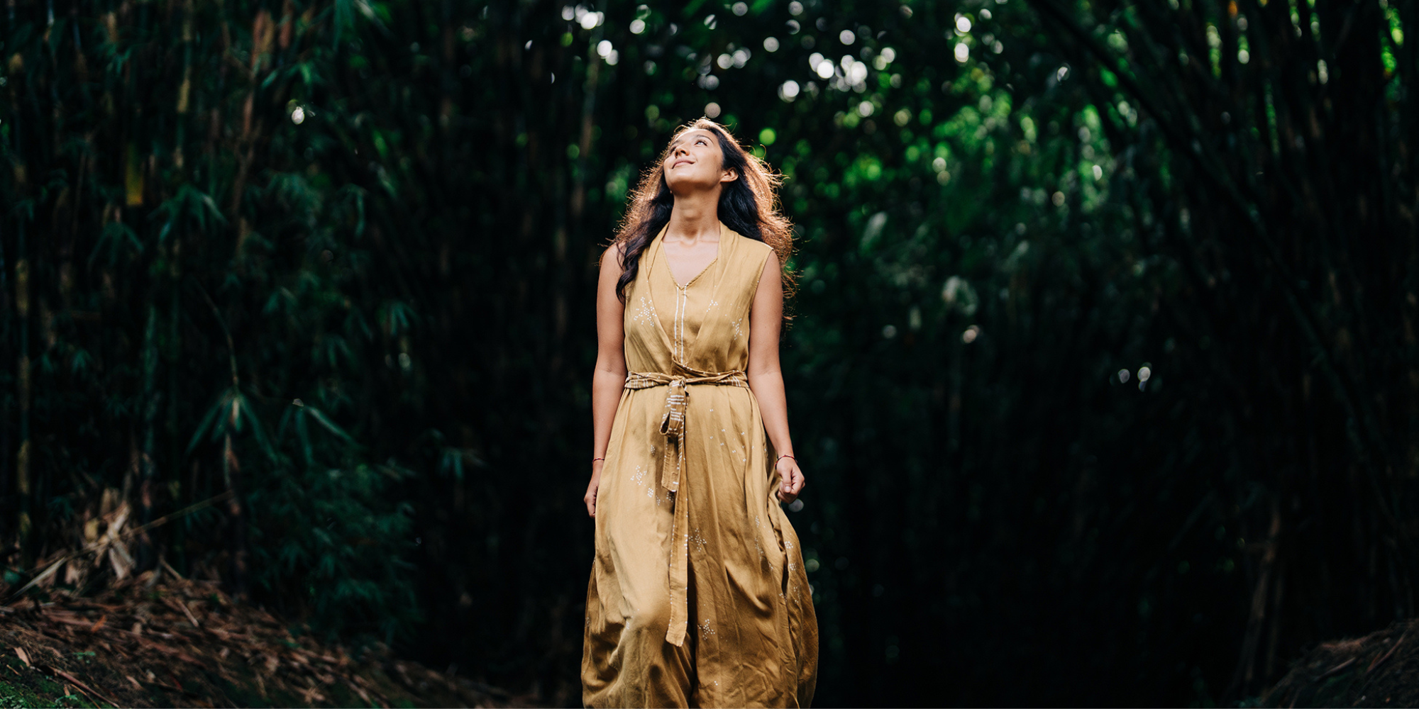 Someone in a gorgeous, flowing gold dress by SukkhaCitta.