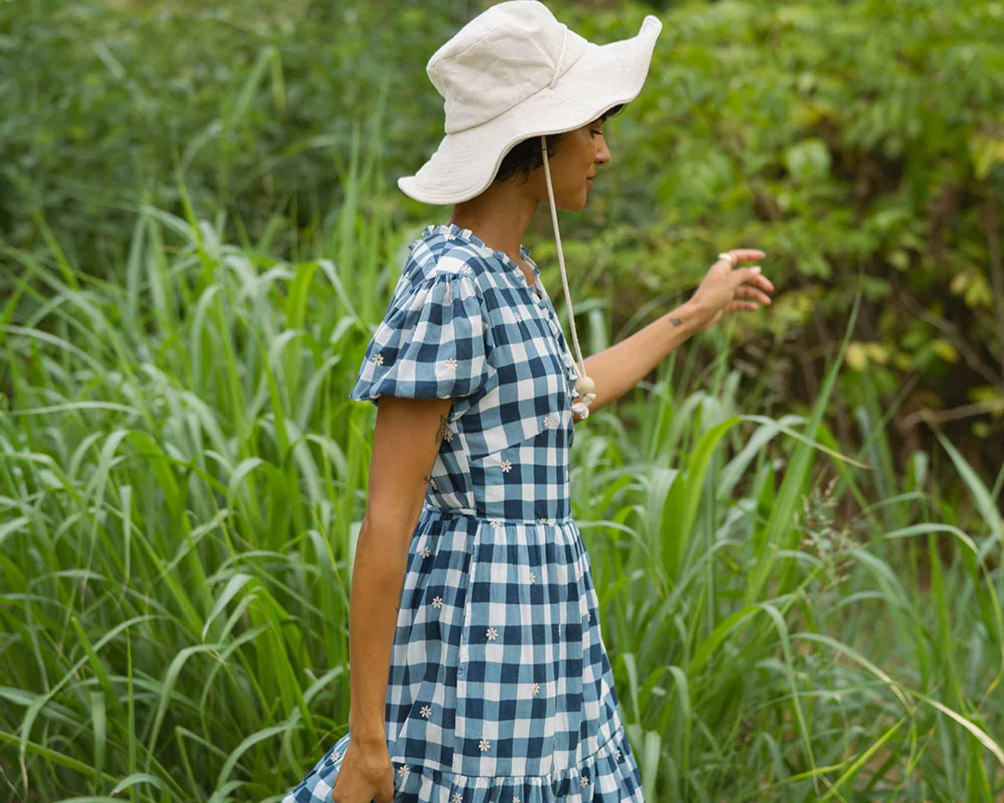 Woman wearing checked dress by harpersage