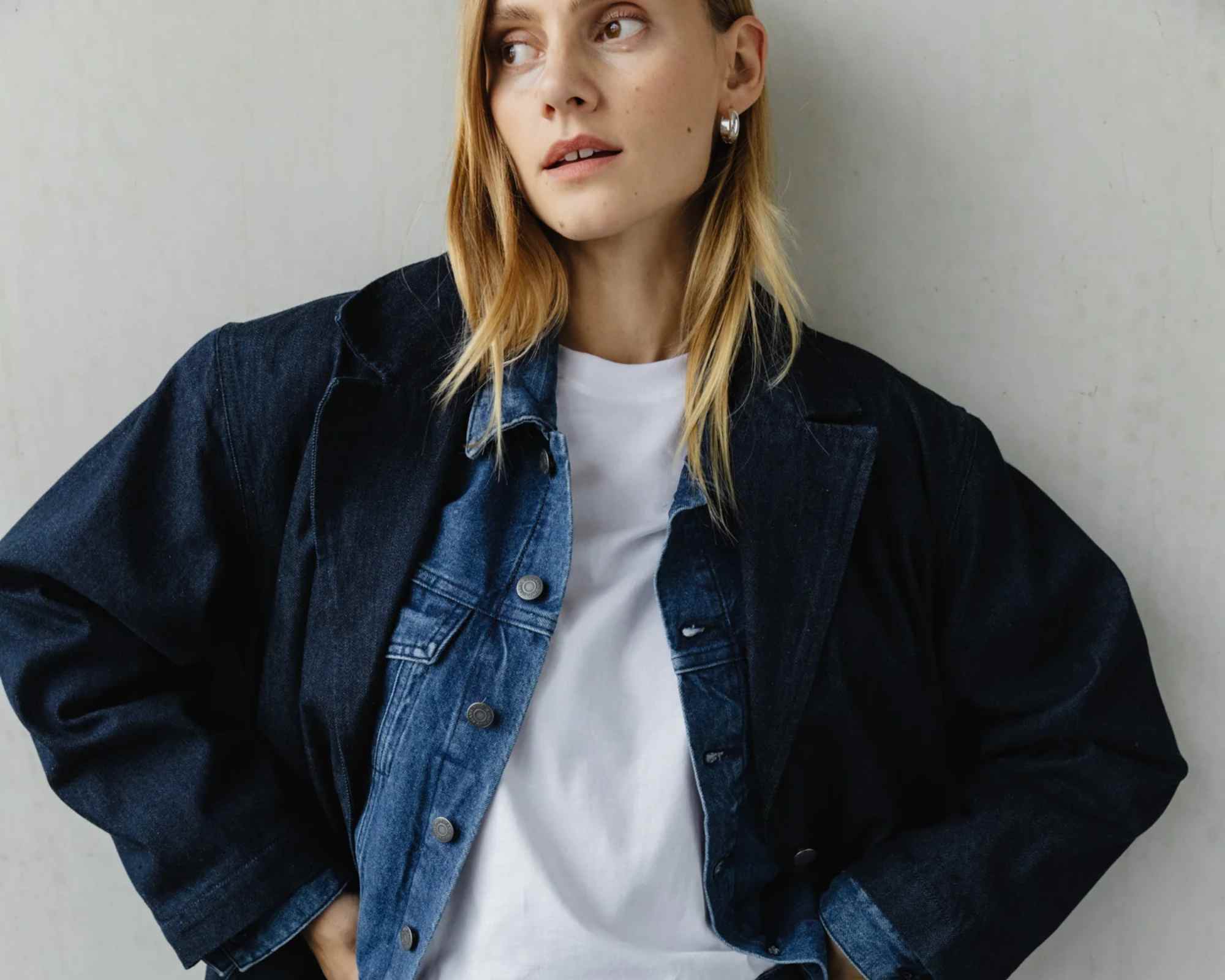 person wearing outfit from more sustainable dutch brand mud jeans