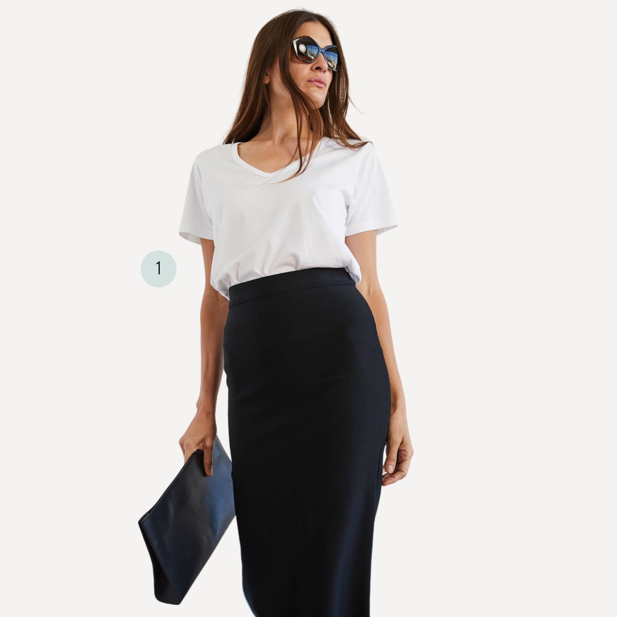 A business look pairing a deep v-neck white organic cotton tee by The Classic T-Shirt Company with a black pencil skirt and clutch.