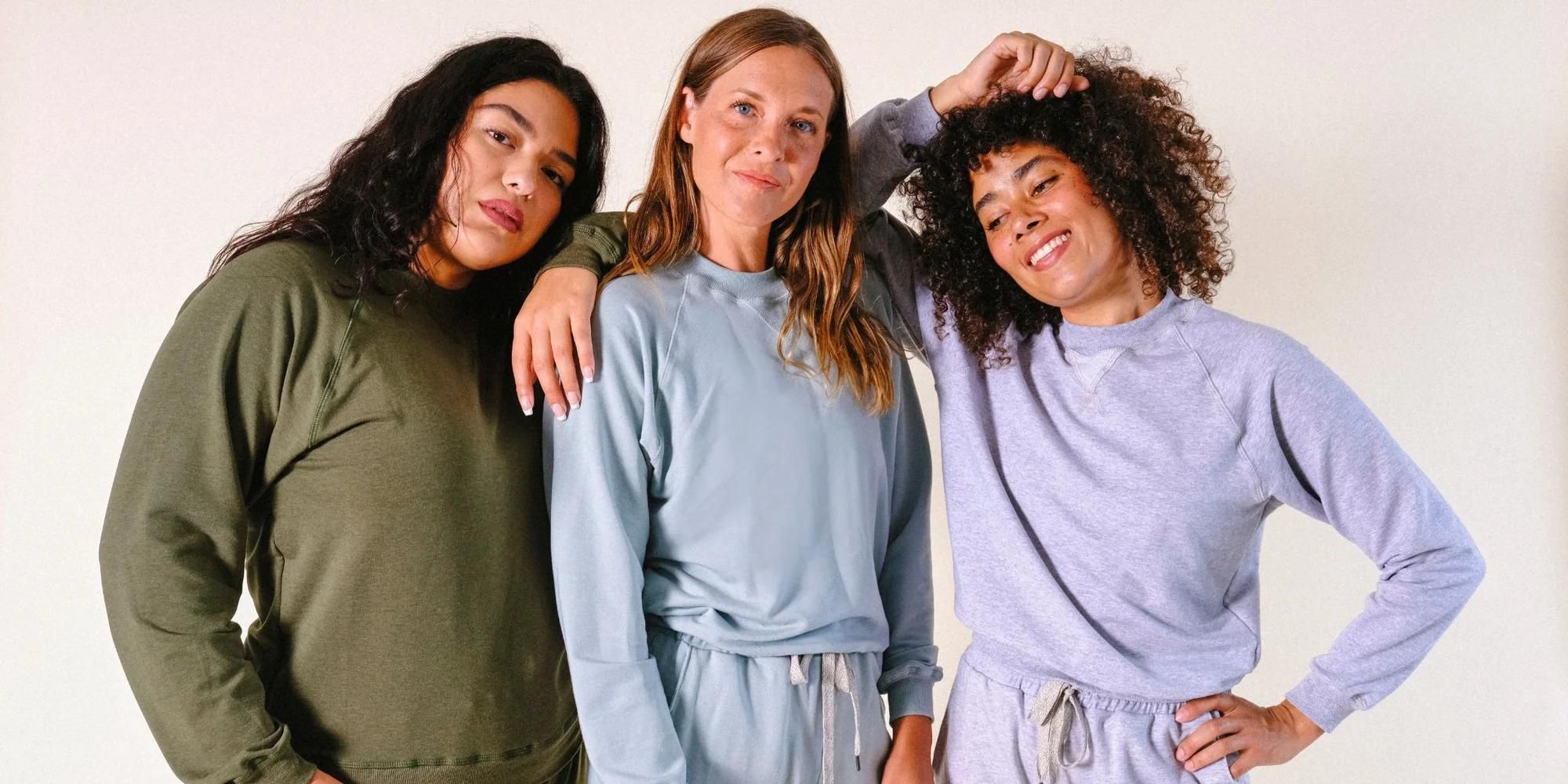 Three people wearing lower-impact loungewear by POPLINEN.