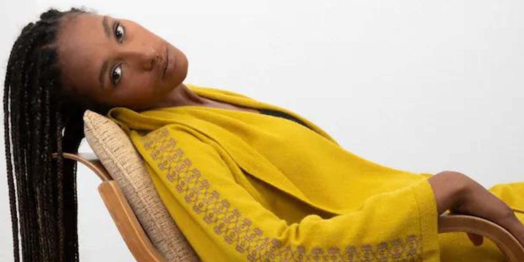 Someone reclining in yellow clothing made by SEP.