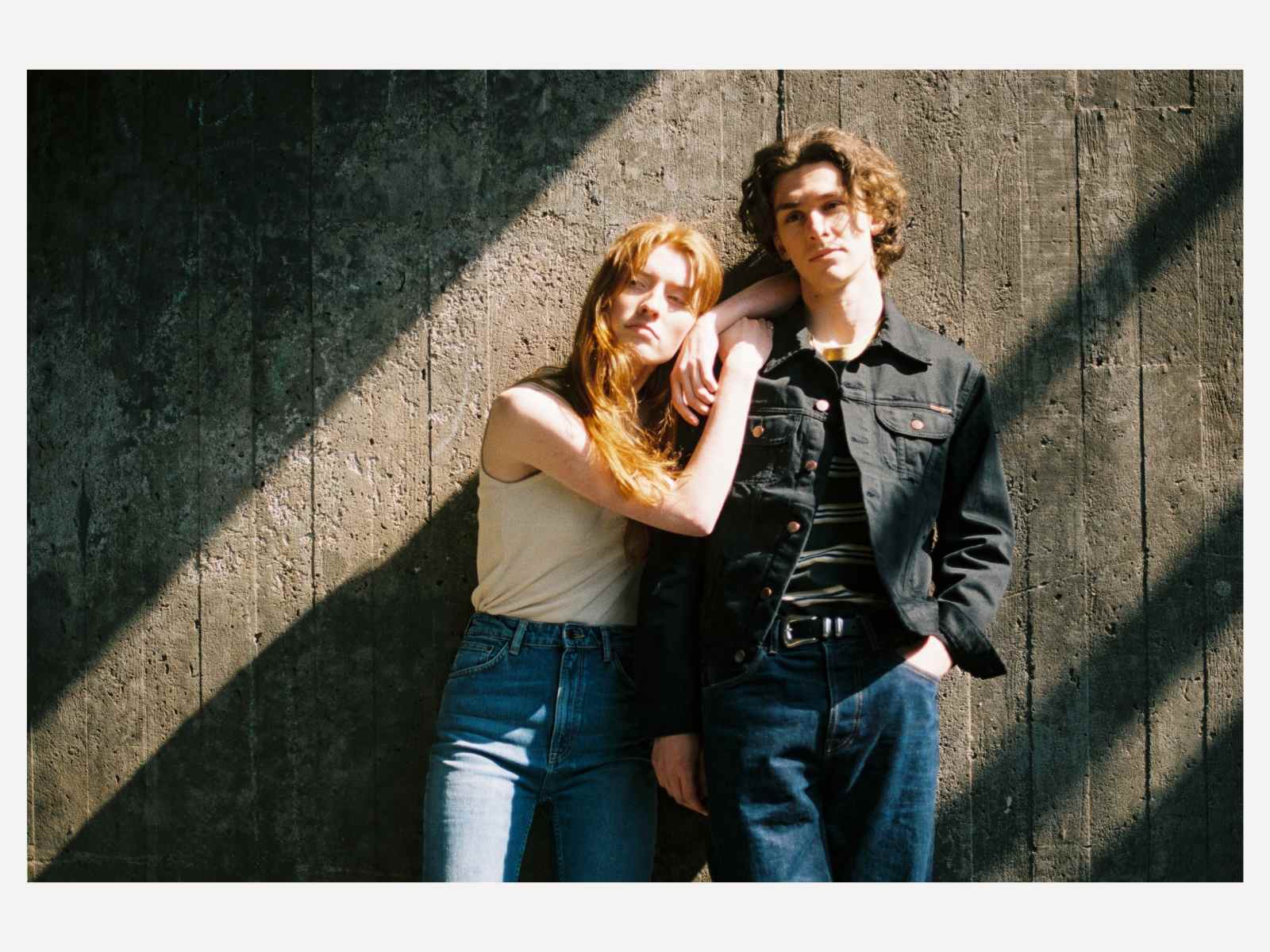 Man and woman wearing Nudie Jeans