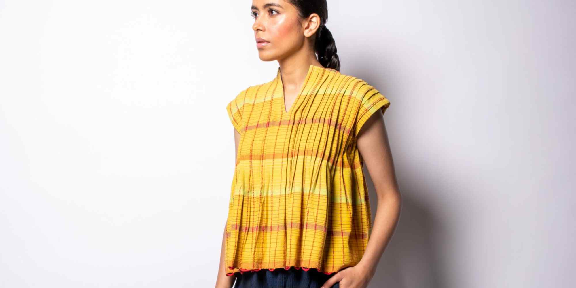 woman wearing IRO IRO brand top