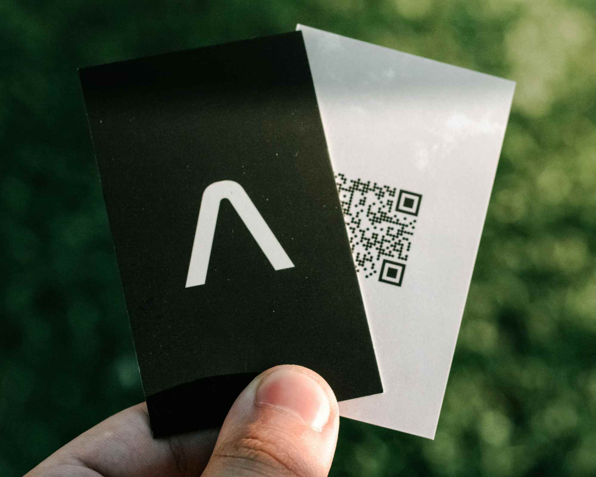 Person holding QR code label