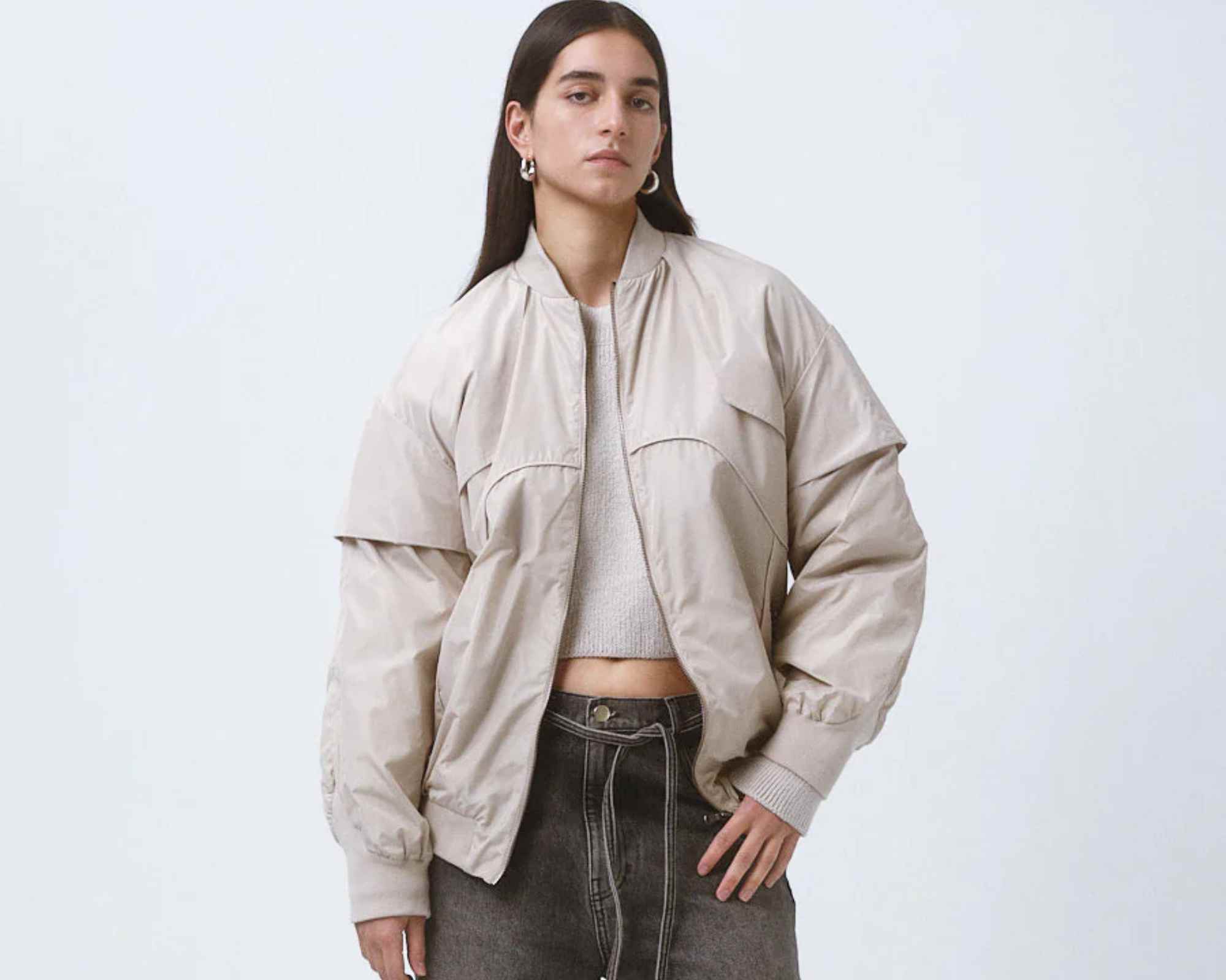Woman wearing bomber jacket from CAES