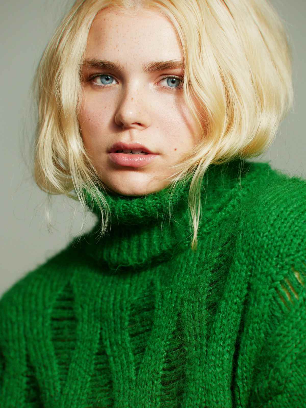 person wearing wool sweater