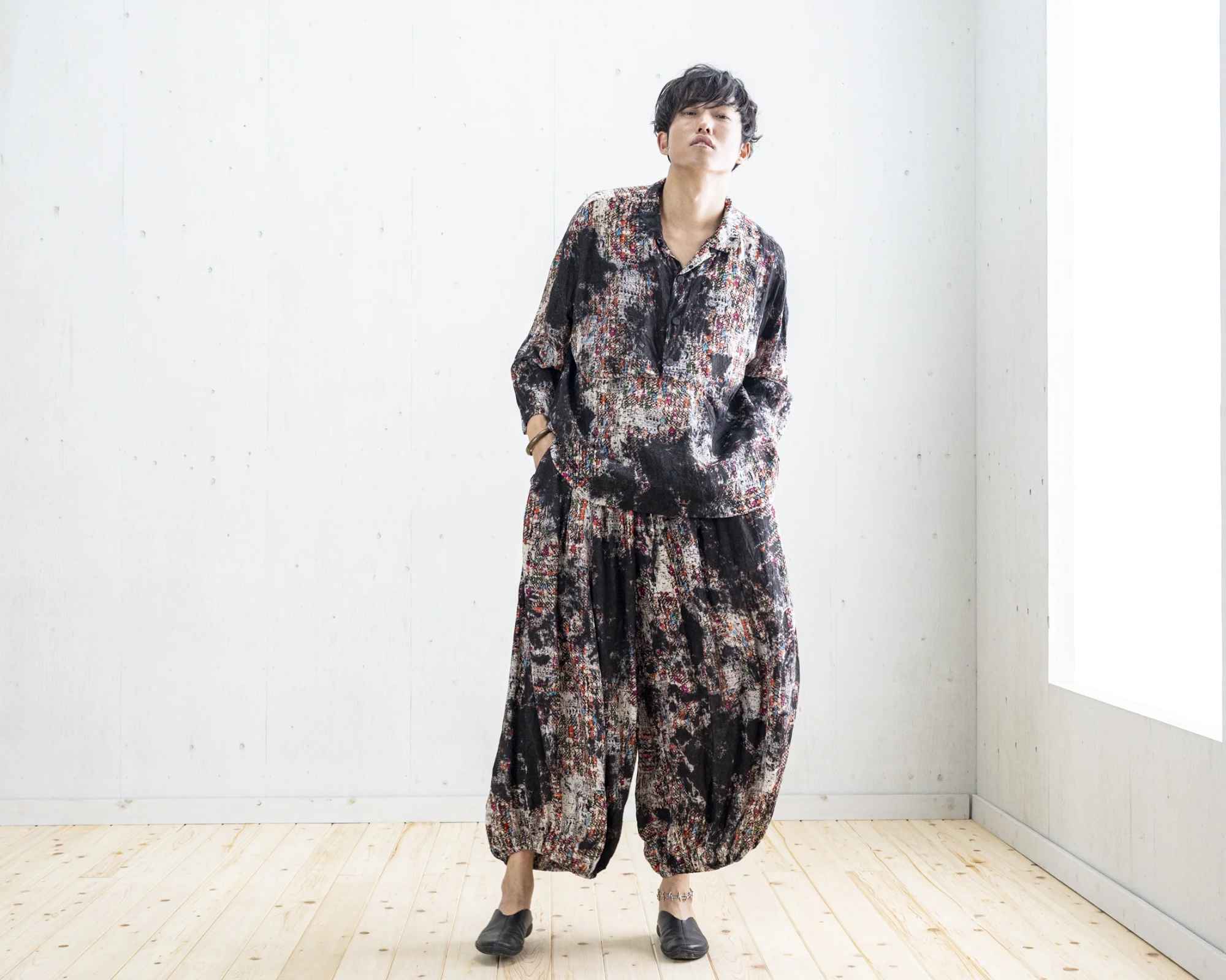 Person wearing voluminous dyed outfit