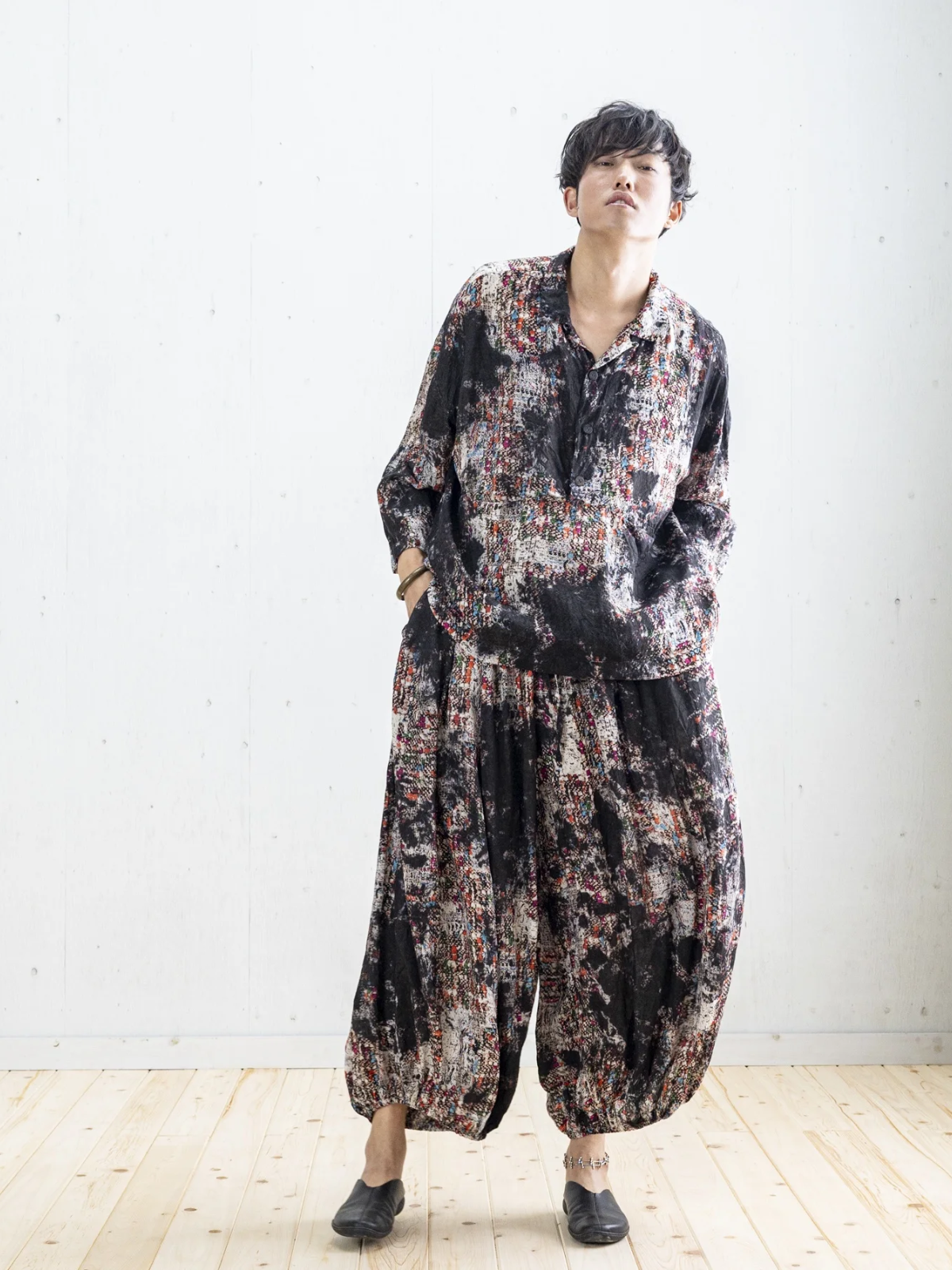 Person wearing voluminous dyed outfit