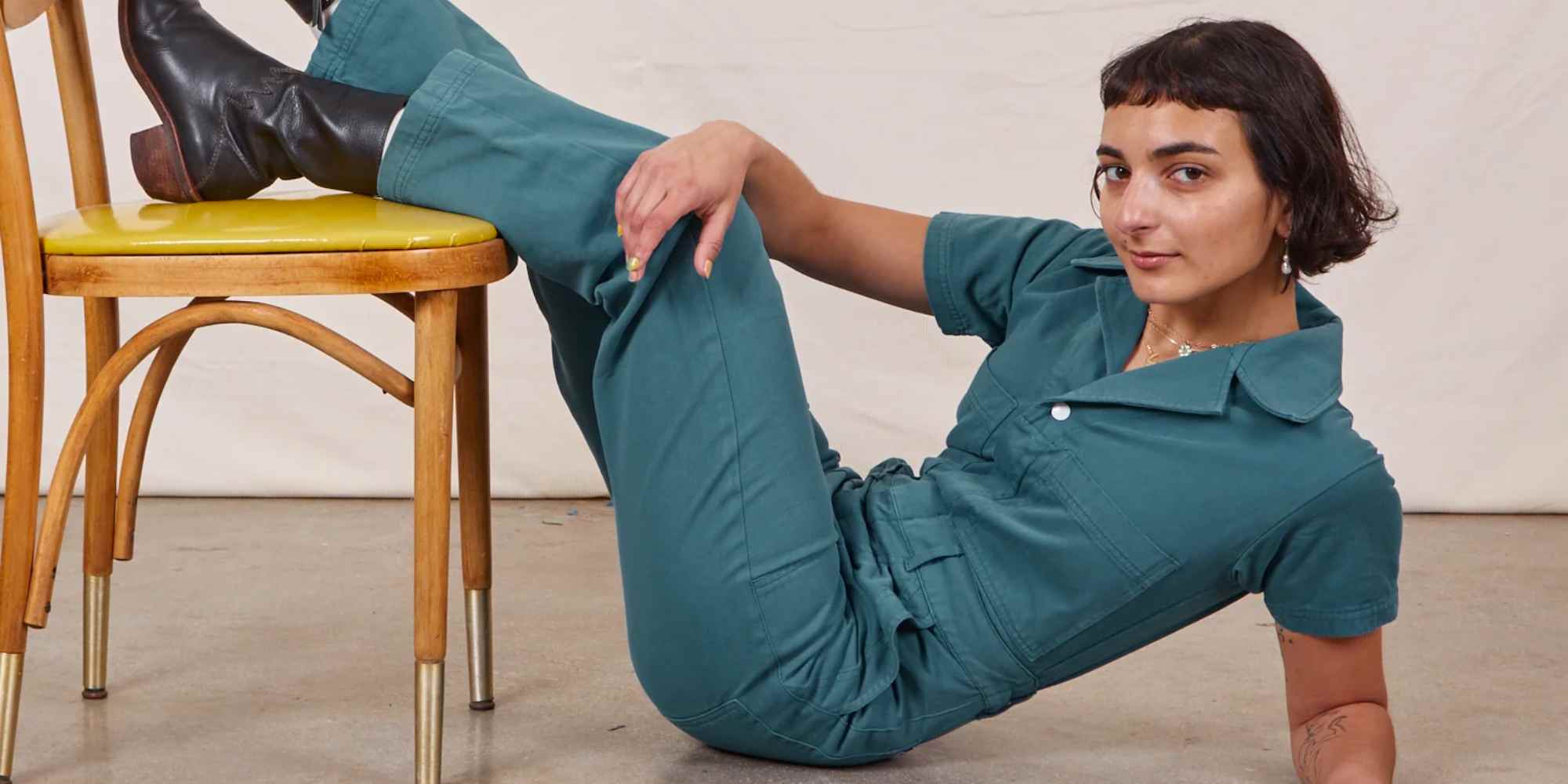 Model wearing jumpsuit from Big Bud Press