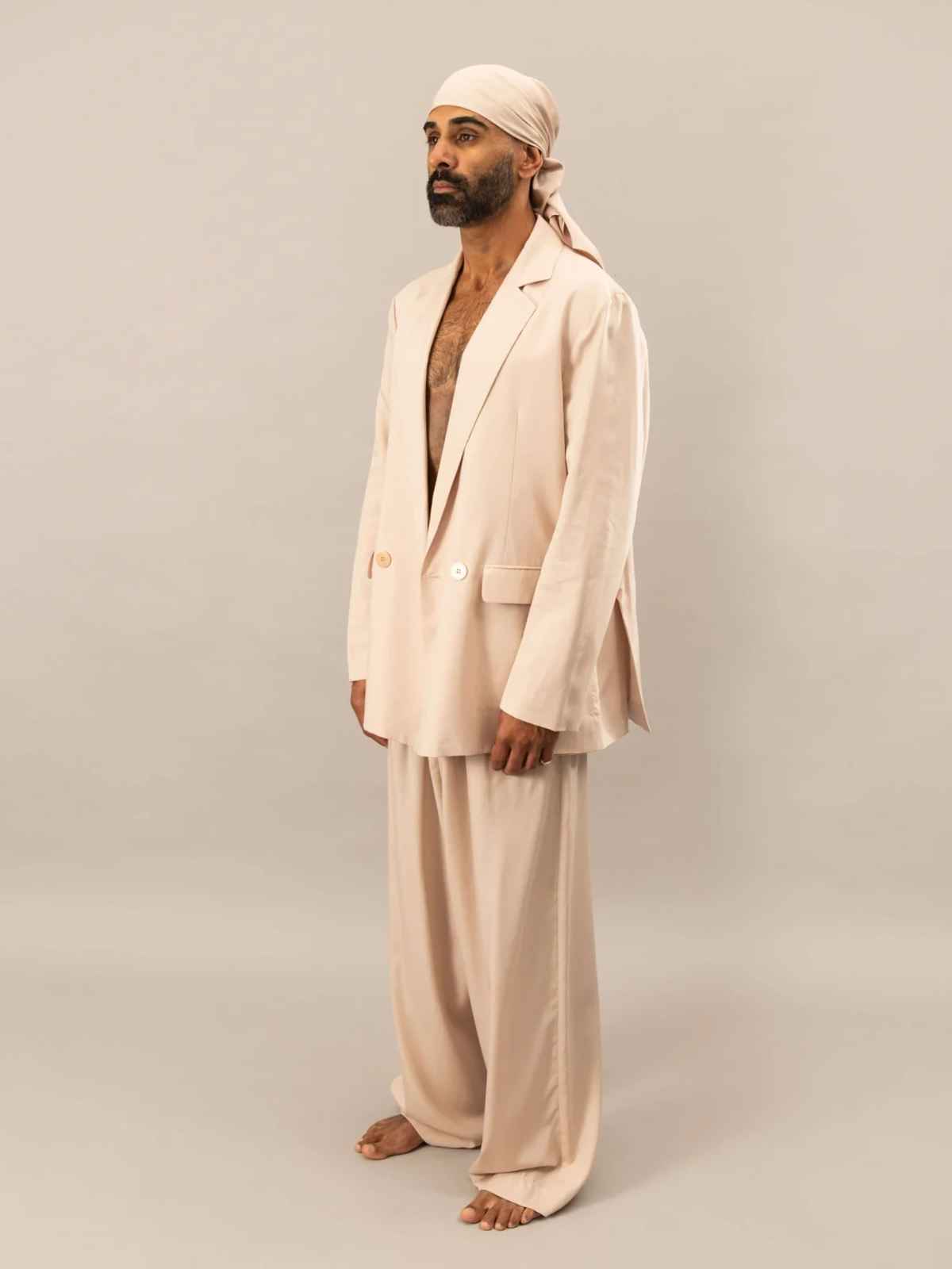 person wearing more sustainable tailoring from The Glade