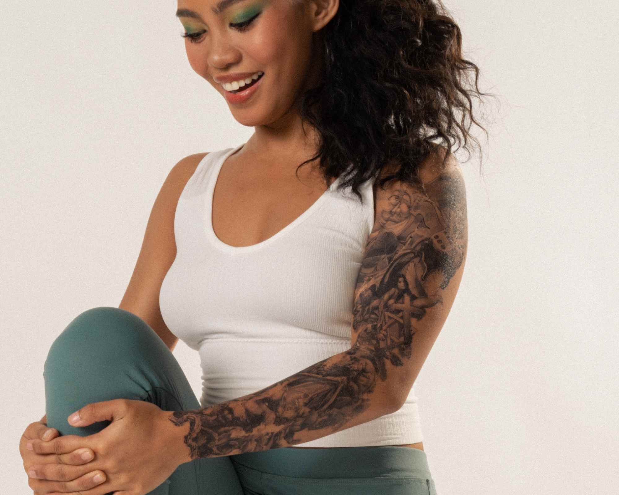 Person wearing green and white activewear