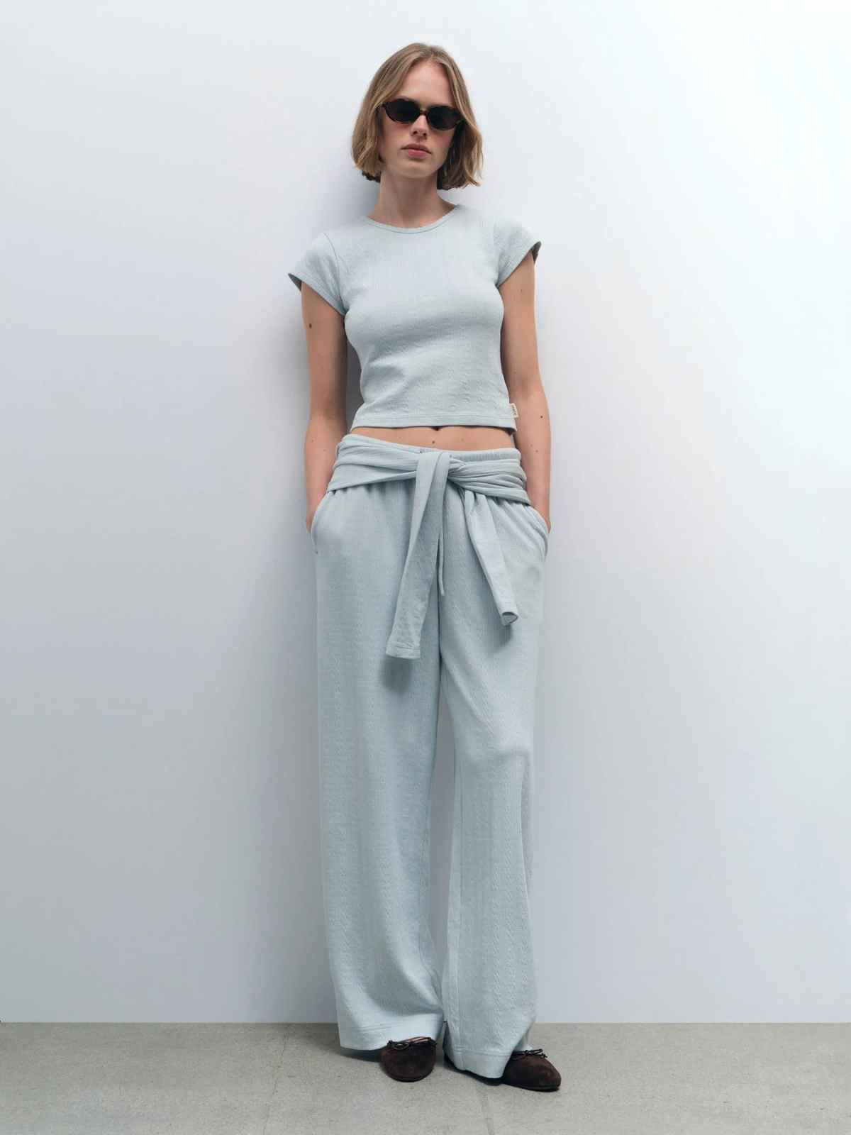 person wearing more sustainable loungewear set from mate the label