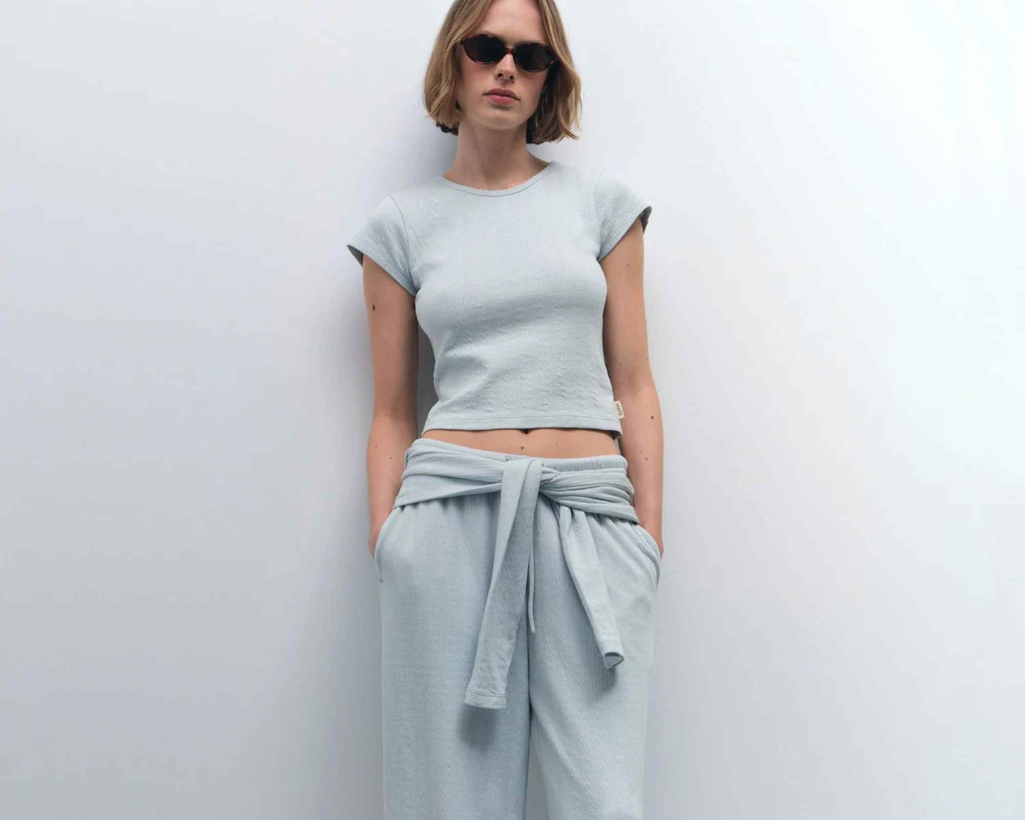 person wearing more sustainable loungewear set from mate the label