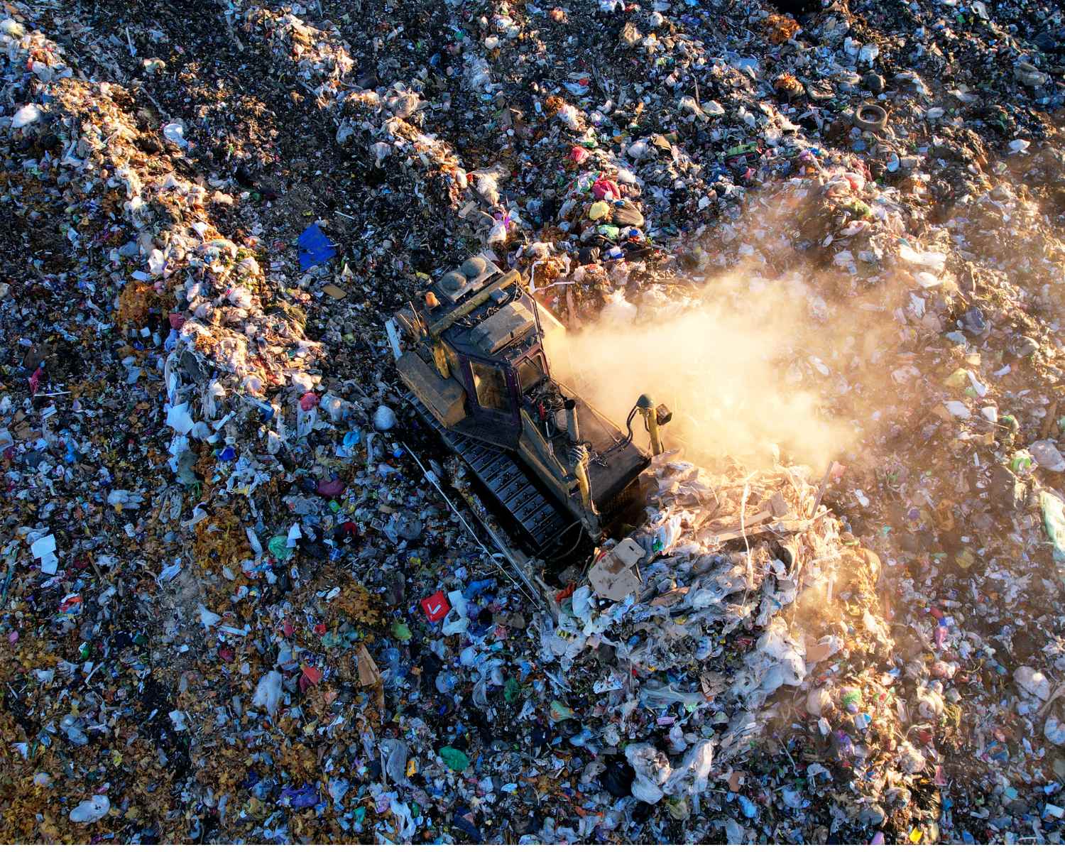 Consumer waste site with machinery