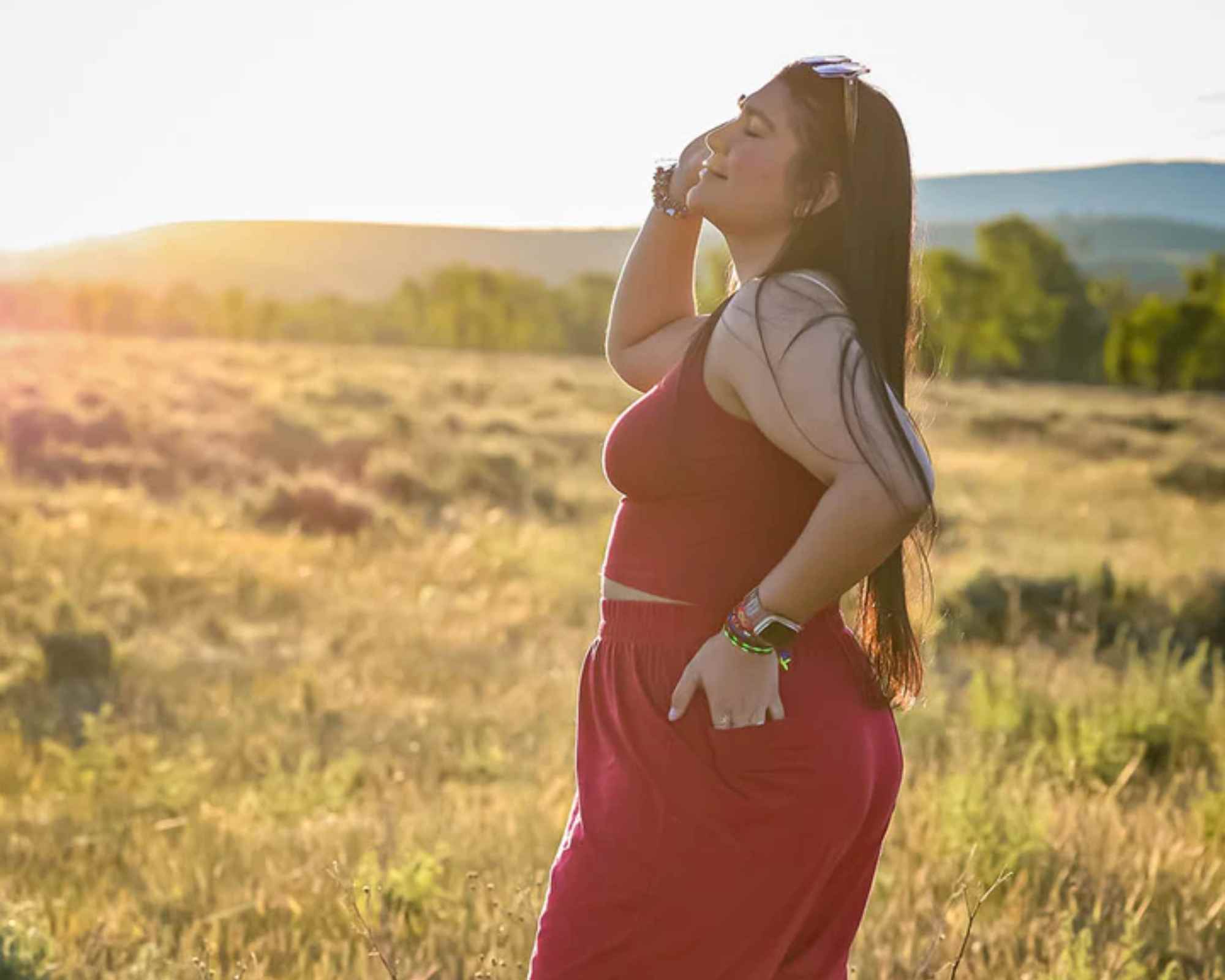 Person in grass wearing pink clothes from Miakoda