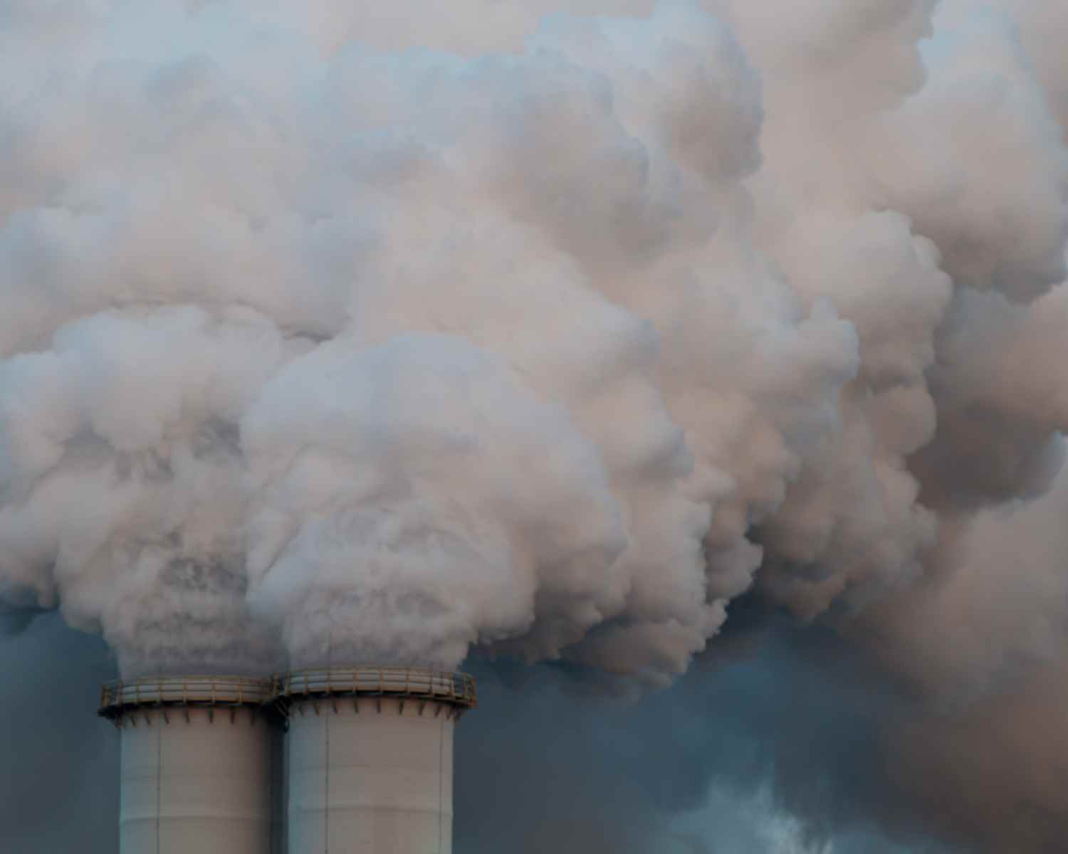 Smoke rising from industrial chimneys