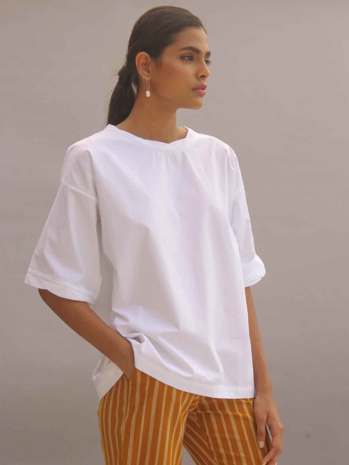 person wearing more sustainable tshirt