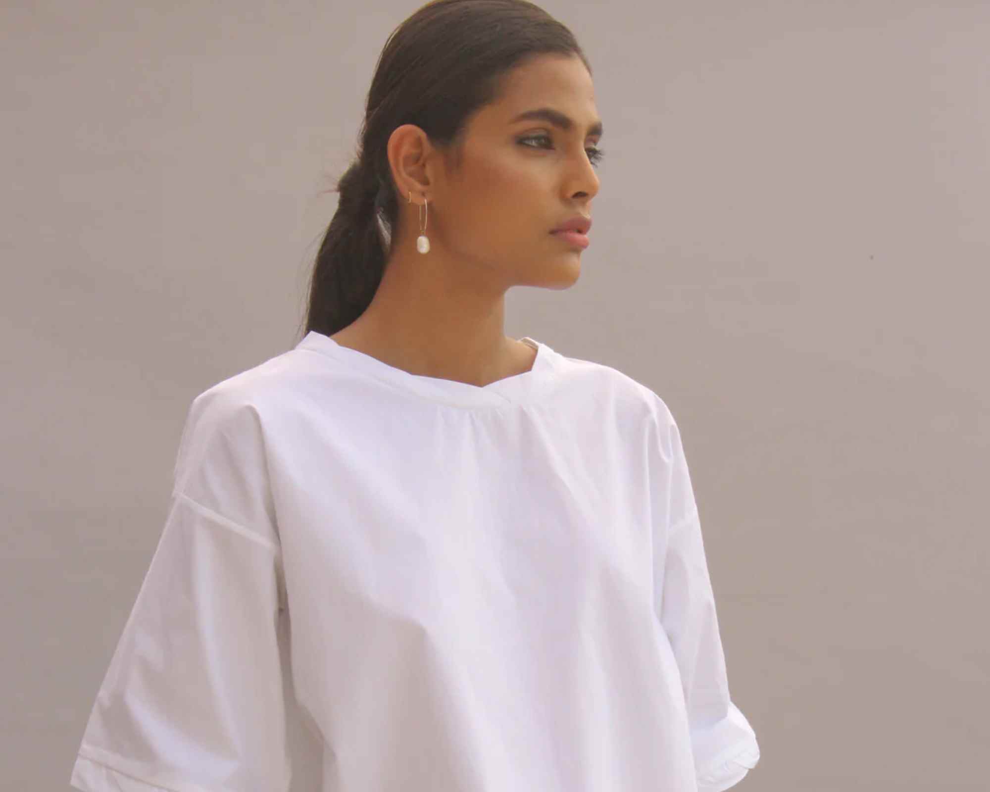 person wearing more sustainable tshirt