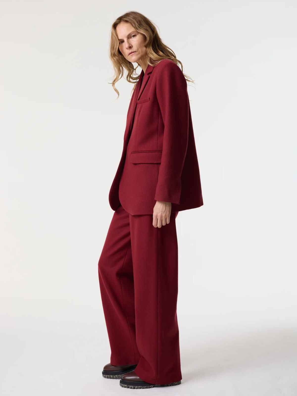 person wearing red suit from akyn